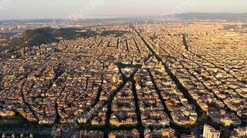 Preview: Overhead View of Barcelona Skyline: Eixample Residential District at Dawn in Catalonia, Spain