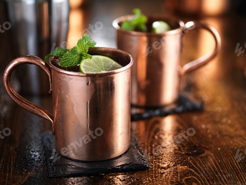 Preview: moscow mules in copper cups with mint and limes