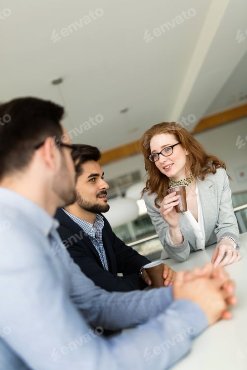 Preview: Picture of business people discussing in their company