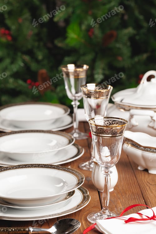 Preview: Close up of holiday table setting modern interior