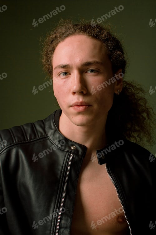 Preview: Attractive And Stylish Guy With Curly Hair And A Sports Figure