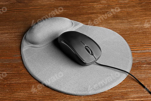 Preview: Blank pad and computer mouse on wooden background