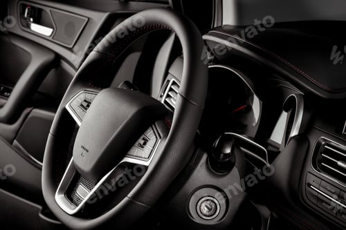 Preview: Leather-covered steering wheel of a new SUV car
