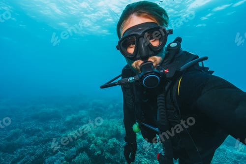 Preview: selfie of a scubadiver in tropical water