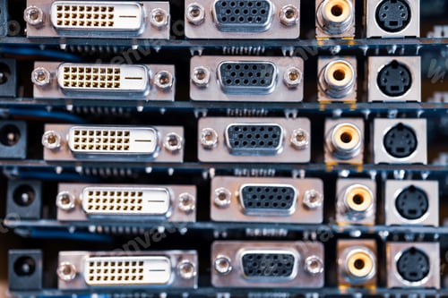 Preview: Close-up blurry metal sockets on a computer video board