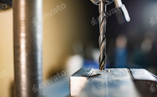 Preview: Drill close-up at the workplace in workshop