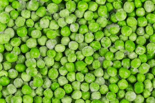 Preview: Frozen green peas as a background.