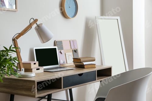 Preview: Comfortable Workplace With Modern Laptop In Room