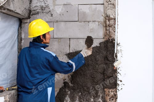 Preview: Labourer Applying Cement on Wall