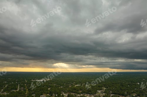 Preview: Landscape of dark ominous clouds forming on stormy sky