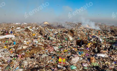 Preview: Burning trash piles in landfill