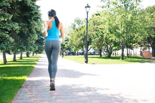 Preview: Sports woman running outdoors
