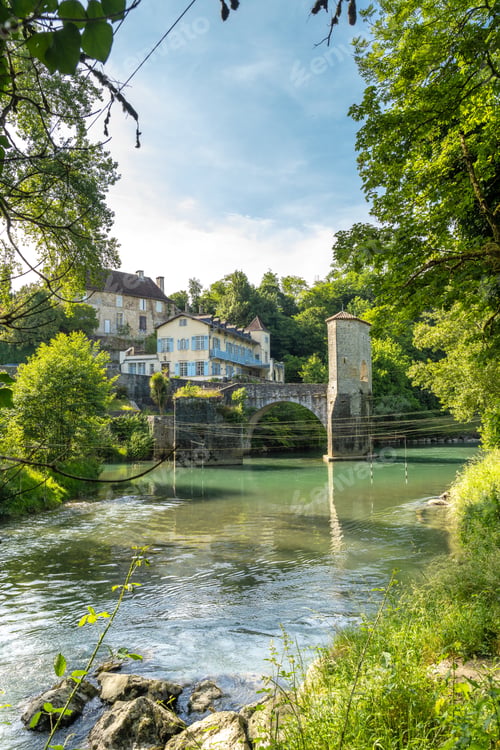 Preview: Old stone bridge over gave d'oloron river in sauveterre de bearn, france