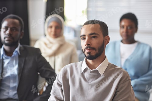 Preview: Business Professionals Attending Meeting in Conference Room