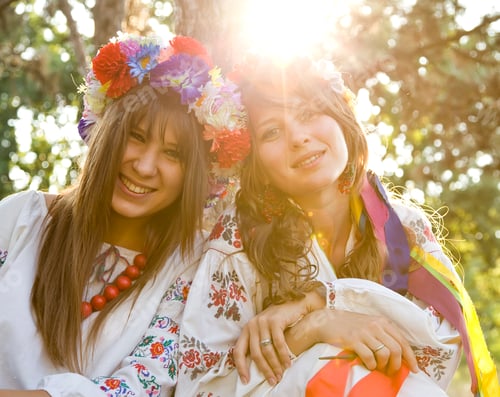 Preview: Two girls in national slavic costumes at outdoor.