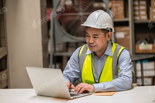Preview: senior adult supervisor engineer male happy worker work in factory products parts storage.