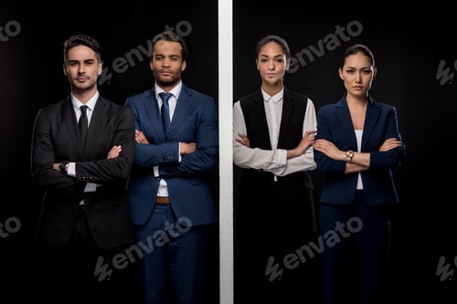 Preview: Group of confident businessmen separated by wall with businesswomen and looking at camera isolated