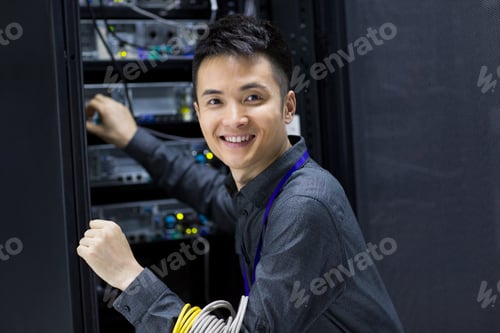Preview: Technician doing maintenance in computer room