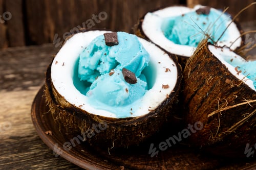 Preview: Blue ice cream in coconut bowl.