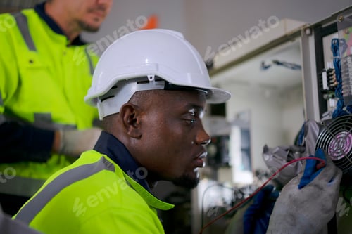 Preview: Engineer work at robotic arm factory.