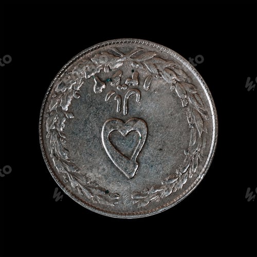 Preview: Old coin isolated on a black background