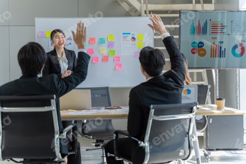 Preview: A group of young Asian businessmen Talking and planning work happily