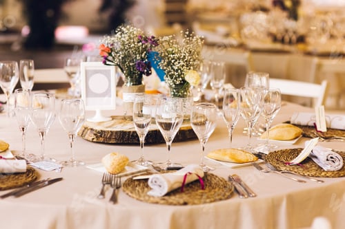 Preview: Decoration of the centerpieces of a wedding with the cutlery and vintage details.