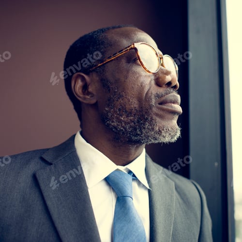 Preview: African Descent Businessman Contemplation Concept