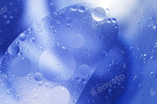 Preview: Oil bubbles close up. circles of water macro. abstract light blue background
