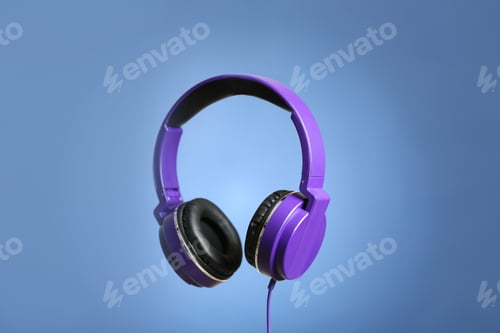 Preview: Stylish headphones with pads on color background