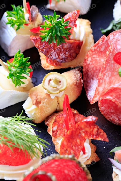 Delicious Appetizers with Pepperoni, Cheese, and Herbs