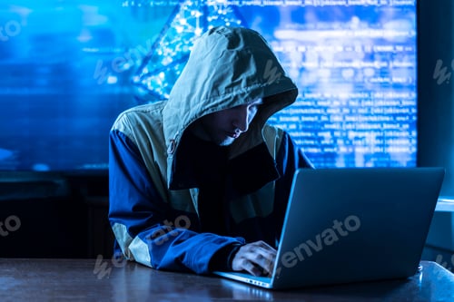 Preview: the anonymous hacker braking the personal online data in his office, dark blue, deep web
