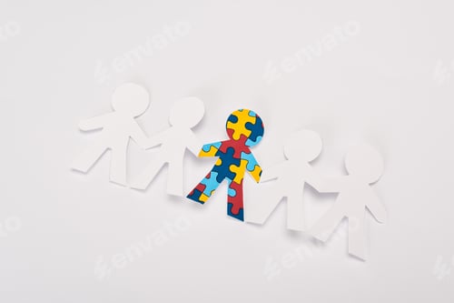 Preview: High angle view of special kid with autism among another on white background