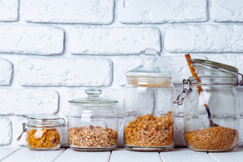 Preview: Glass jars with granola and muesli, front view