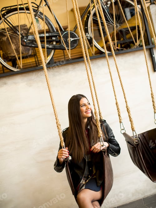 Preview: Woman on swing