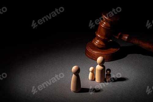 Preview: Wooden toy family and judge mallet. Family divorce concept