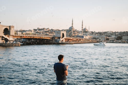 Preview: Young man enjoys sunset and beautiful view in the Istanbul, Turkey