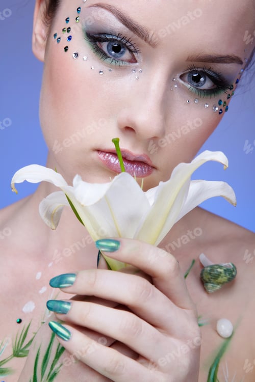 Preview: Portrait Of Beautiful Girl With Mermaid Bodyart On Blue