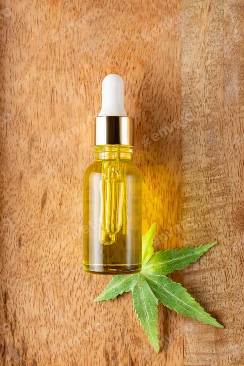 Preview: Natural cosmetic. Herbal Alternative Medicine Concept. Cannabis face serum or oil dropper concept