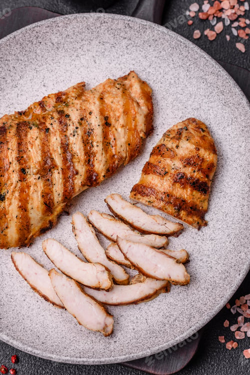 Preview: Delicious fresh grilled chicken fillet with spices and herbs