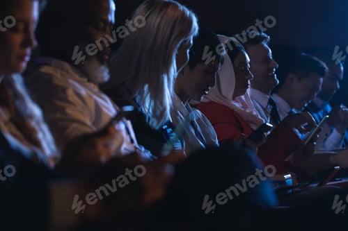 Preview: Business colleague relaxing in the auditorium
