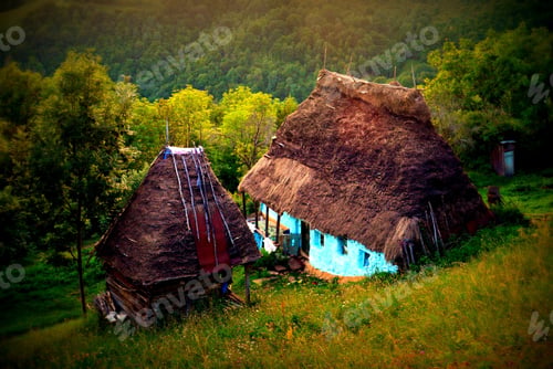 Preview: Rustic shot of old Romanian traditional houses on background of autumn in the village
