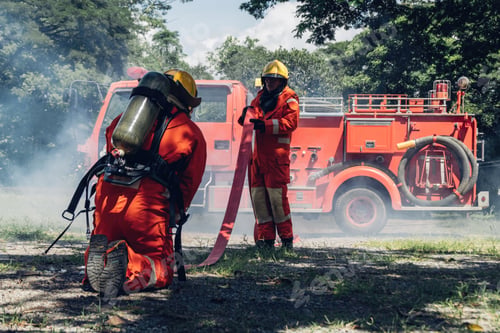 Preview: Firefighter Concept. Several firefighters go offensive for a fire attack.