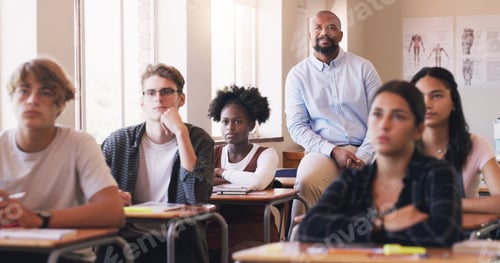 Preview: Shot of mature man teaching a class of teenage students
