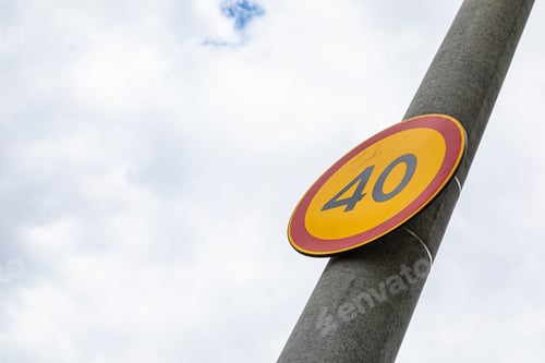 Preview: European roadsign Speed limit forty against cloudy sky