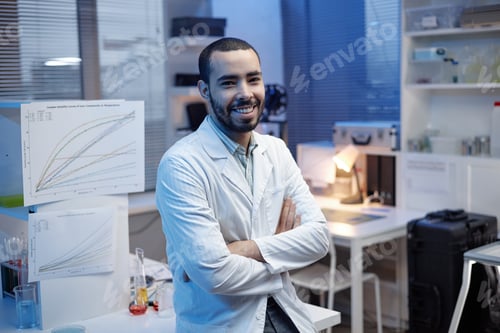 Preview: Portrait of Young Adult Man Smiling in Laboratory Setting