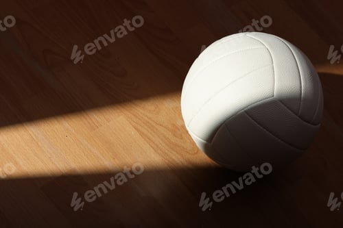 Preview: Volleyball on Wooden Court Floor Corner close up with light reflection with room