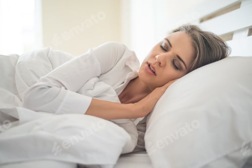 Preview: Beautiful Young woman sleeping in bed