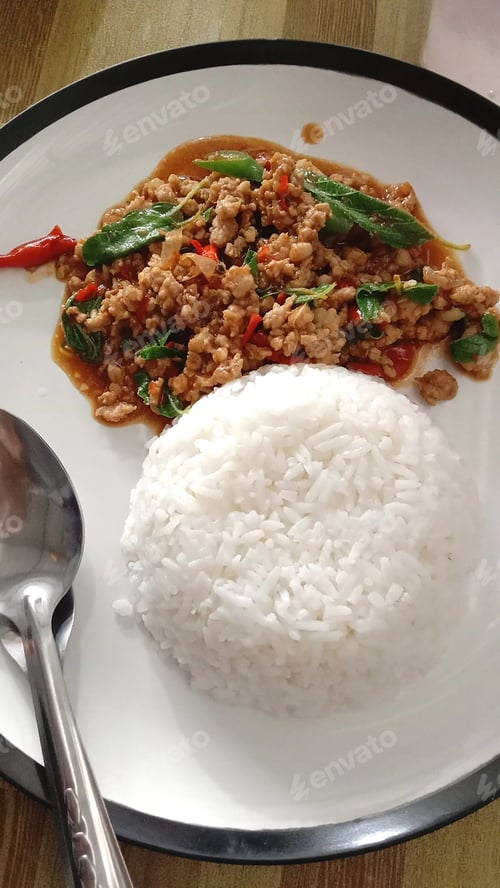 Preview: Chicken Basil with Rice on wgite plate