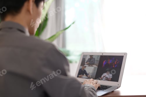 Preview: Businessman making video call with colleagues online meeting, learning, teaching, online